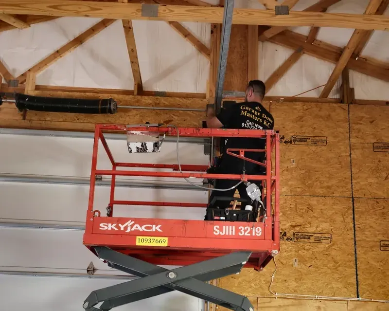 Technician on our scissor lift on a commercial job